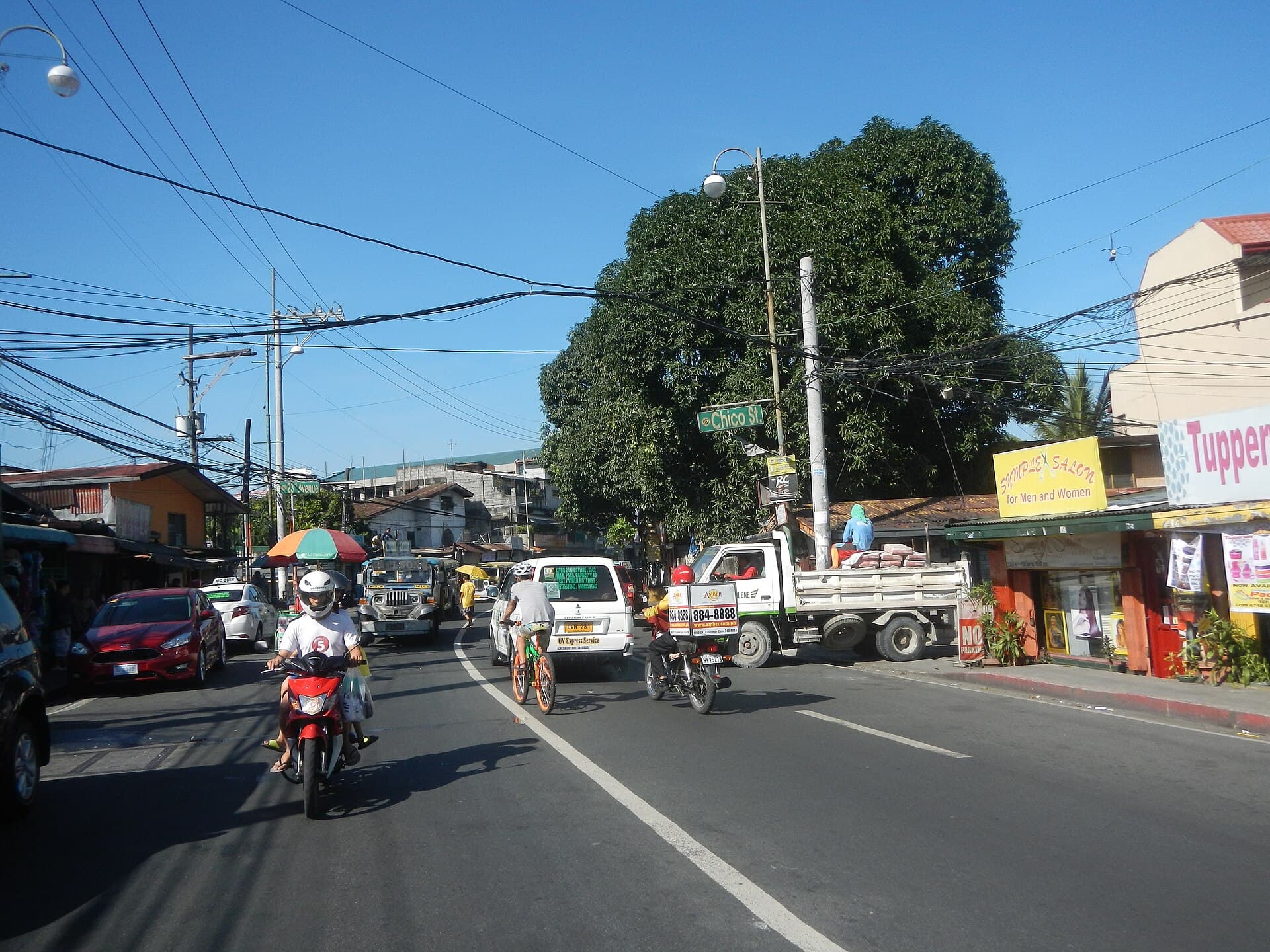 Manila East Road in Angono, Rizal, with jeepneys and traffic