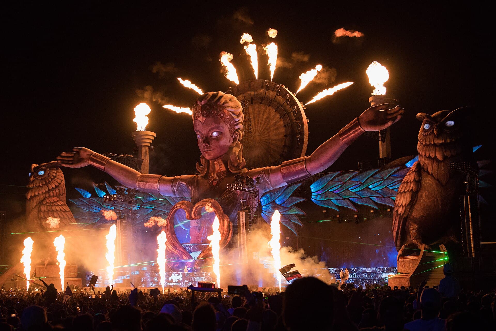 Crowd at the Neon Garden stage at EDC Orlando under coloured lights