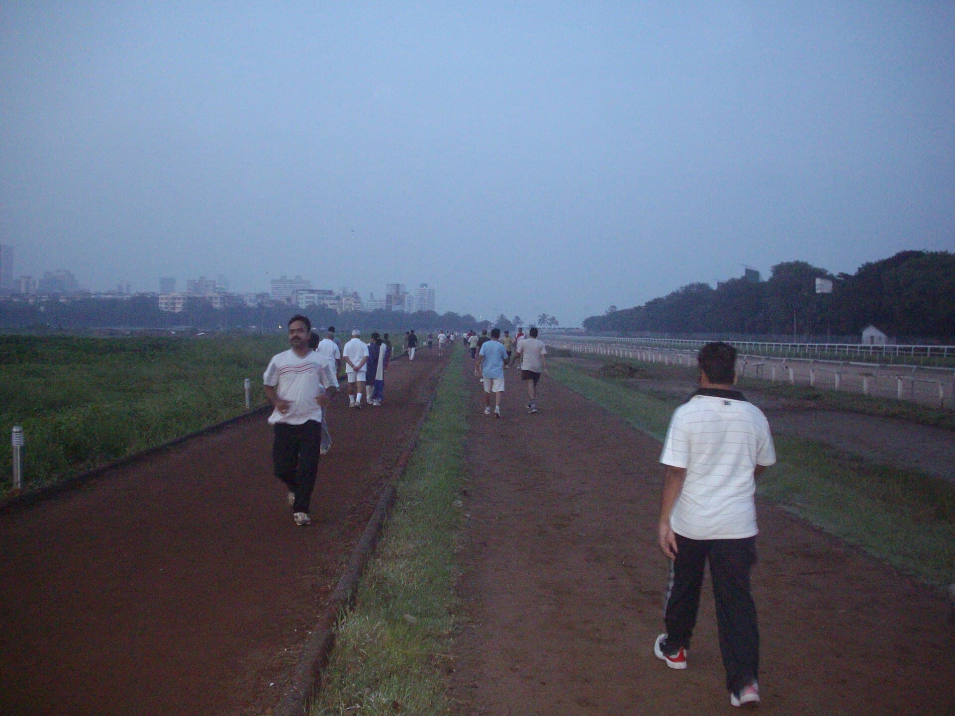 Crowds leaving Mahalaxmi railway station towards the racecourse, Mumbai