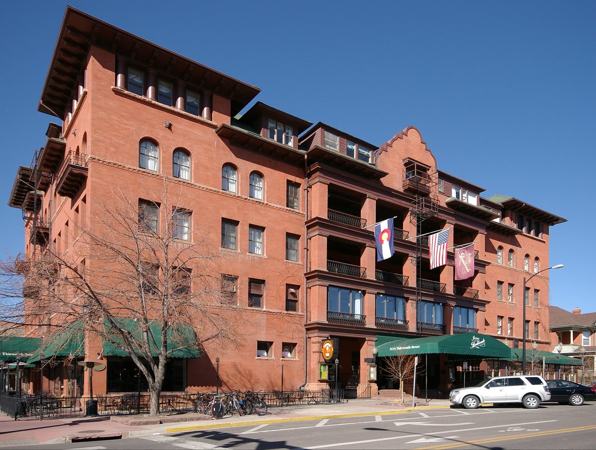The Hotel Boulderado, a historic brick building in downtown Boulder, in winter