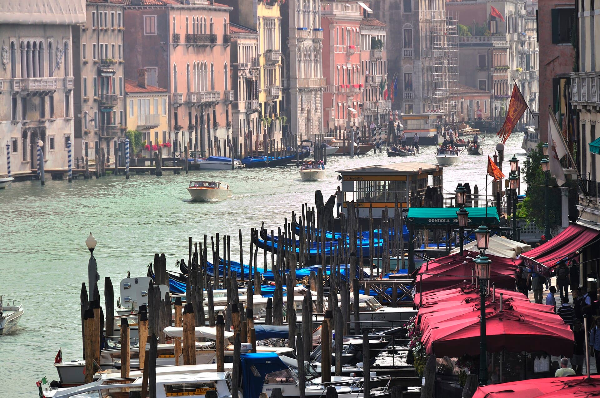 Decorated rowing boats of the Festa Veneziana on the Grand Canal near the Rialto Bridge
