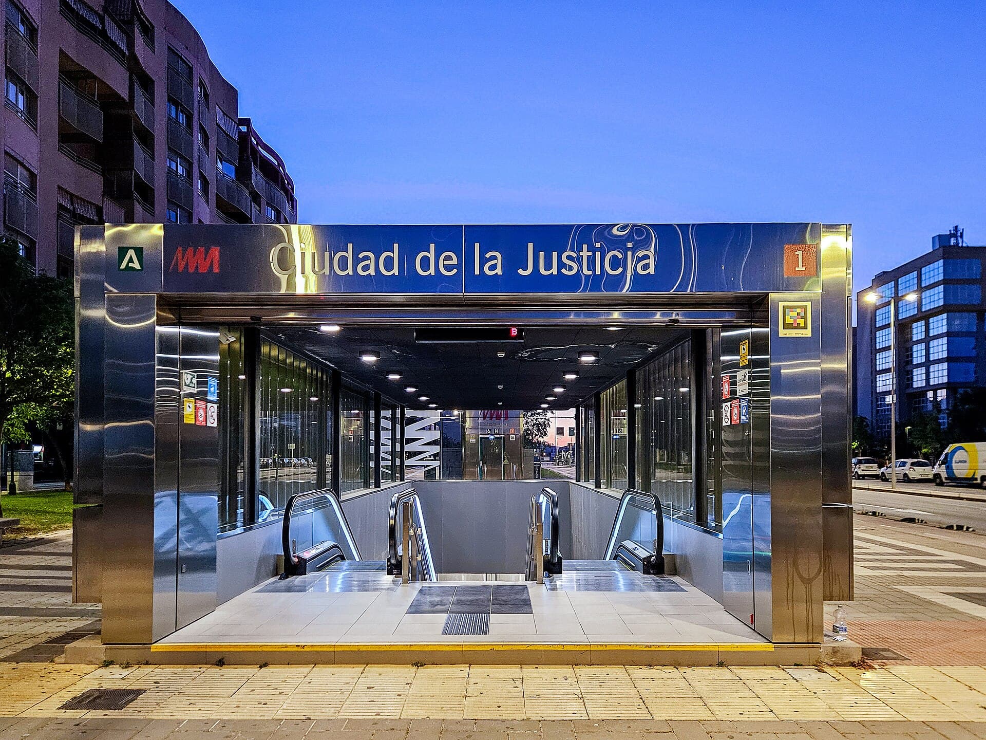 Metro Ciudad Deportiva station entrance on Line 9 with festival crowds walking toward the stadium