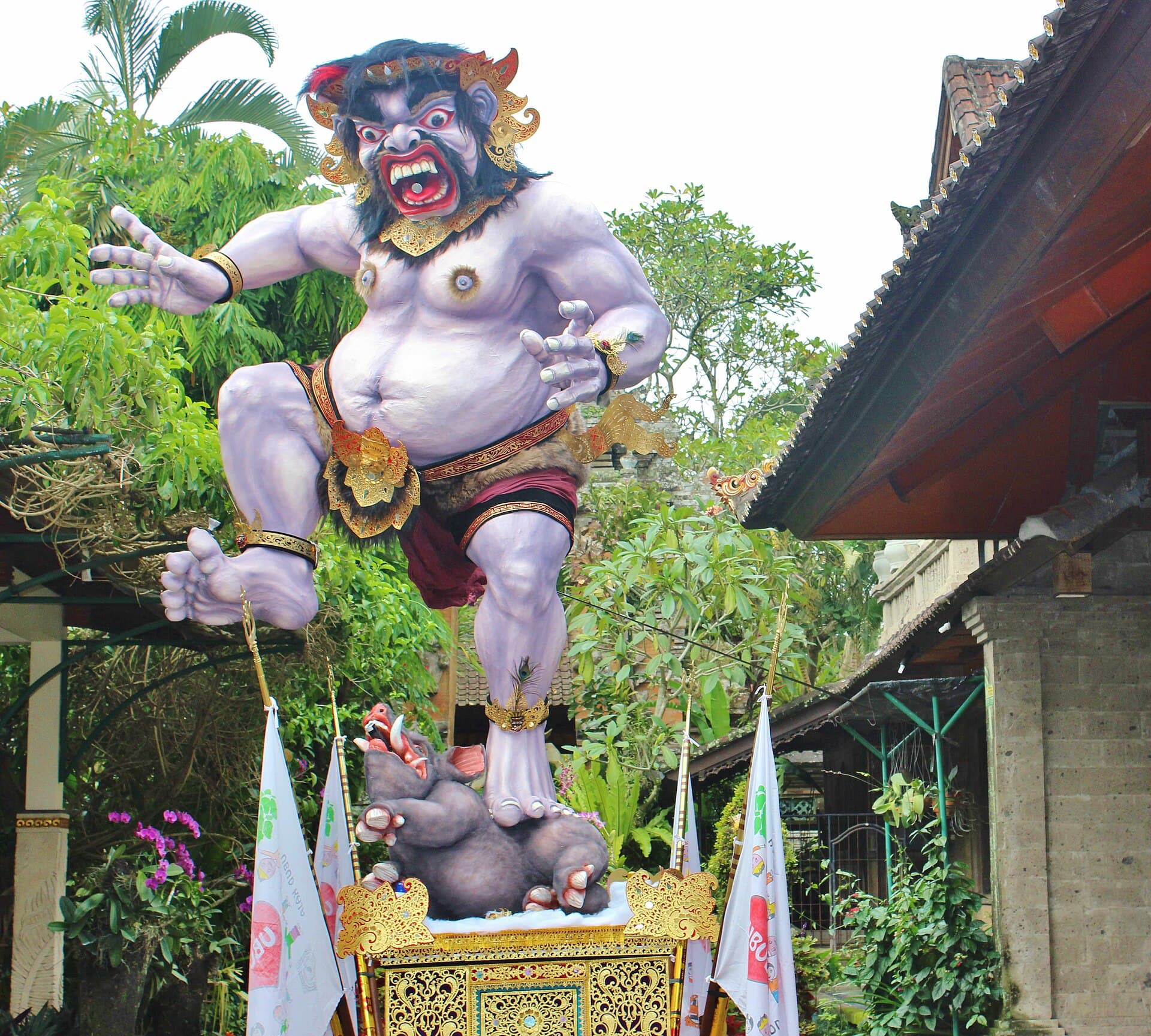Ogoh-Ogoh parade crowd in Denpasar under a dusk sky on the eve of Nyepi