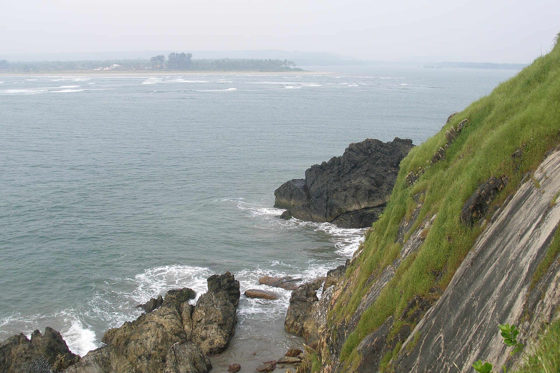 Vagator Beach black rock cliffs in North Goa