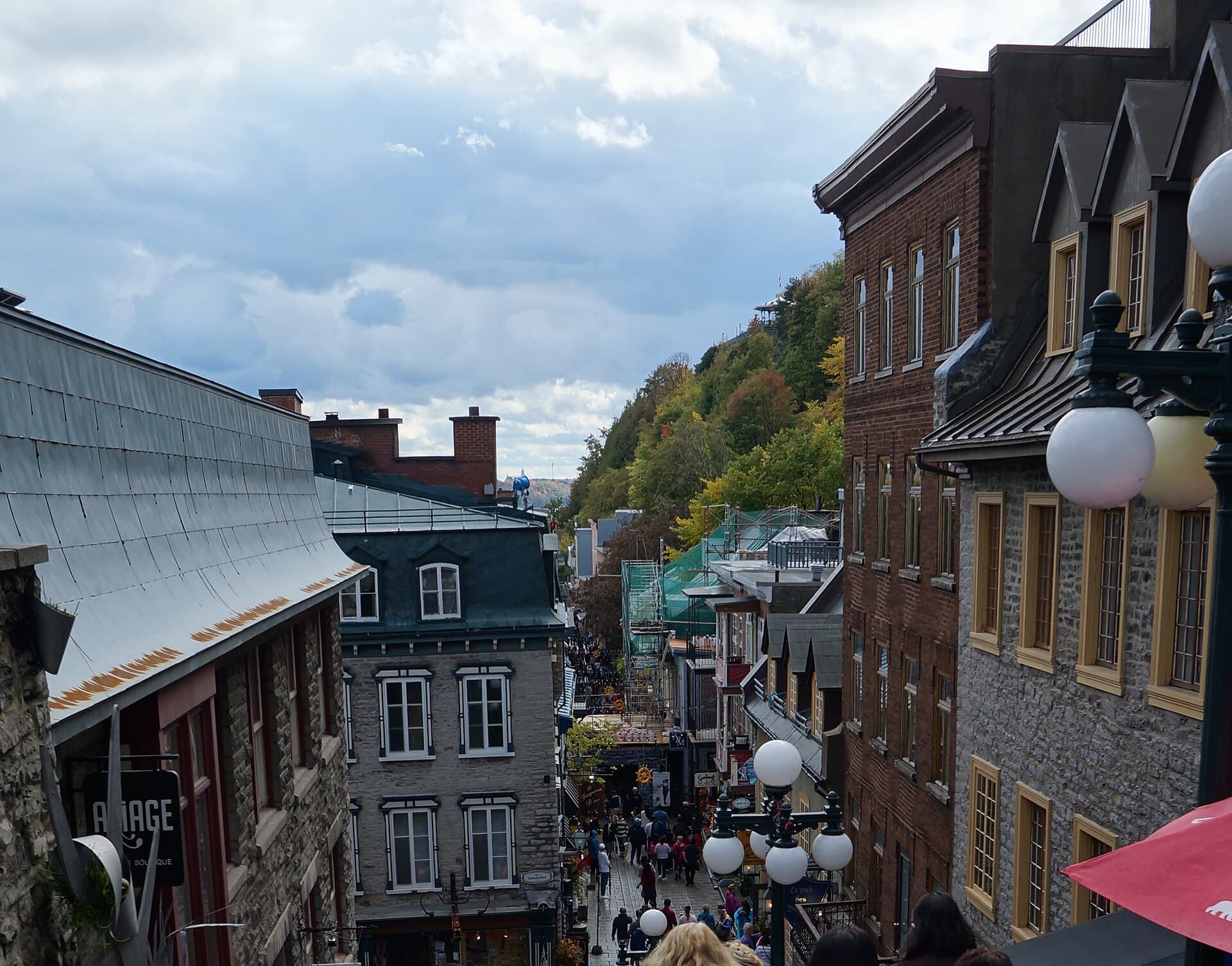 Rue du Petit-Champlain in Lower Town, Old Quebec, covered in snow and strung with lights