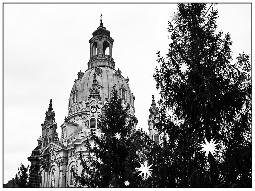 A tray of Pflaumentoffel prune chimney-sweep figures on a market stall