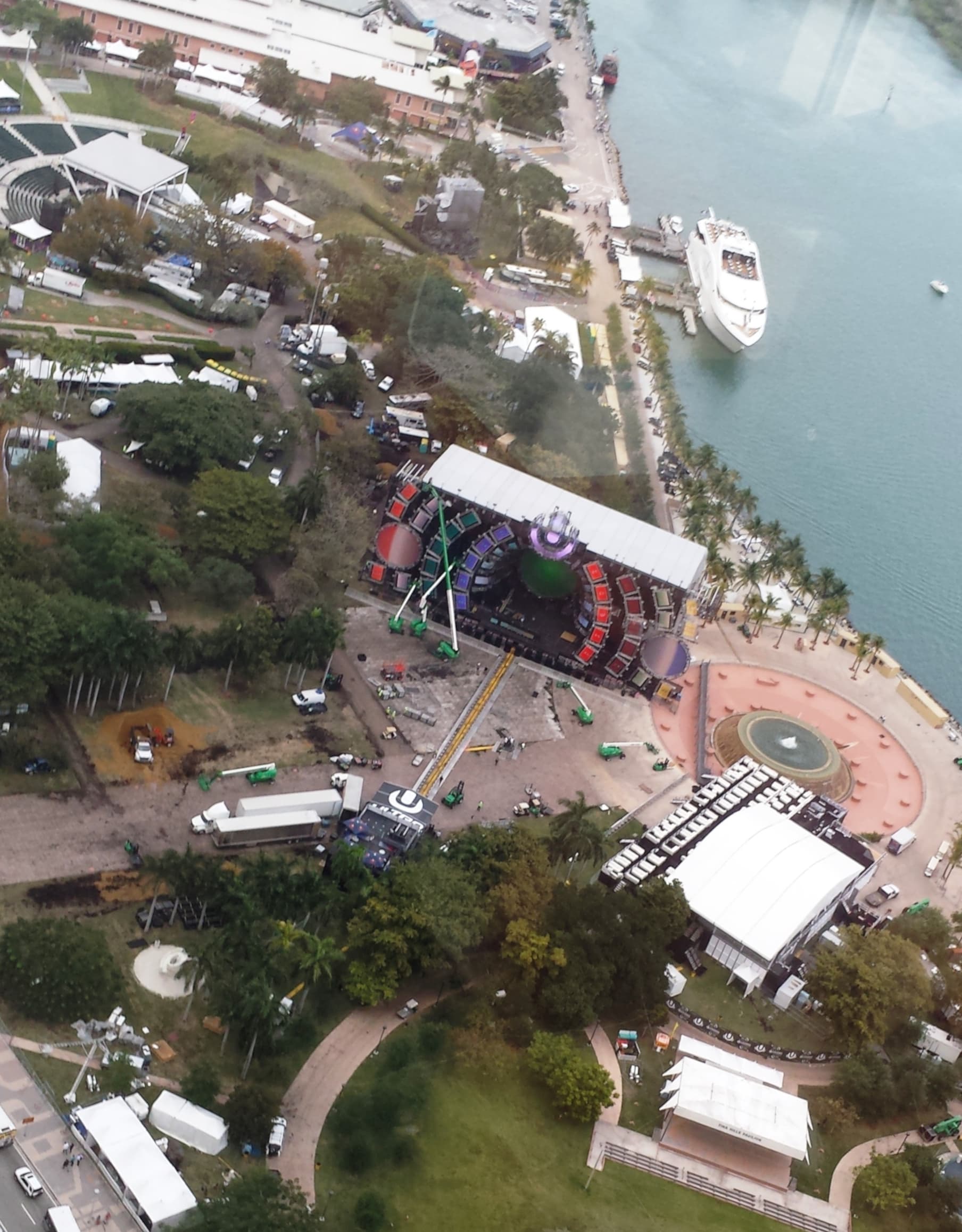 Metromover train gliding past Bayfront Park in Downtown Miami with Biscayne Boulevard and the bay below
