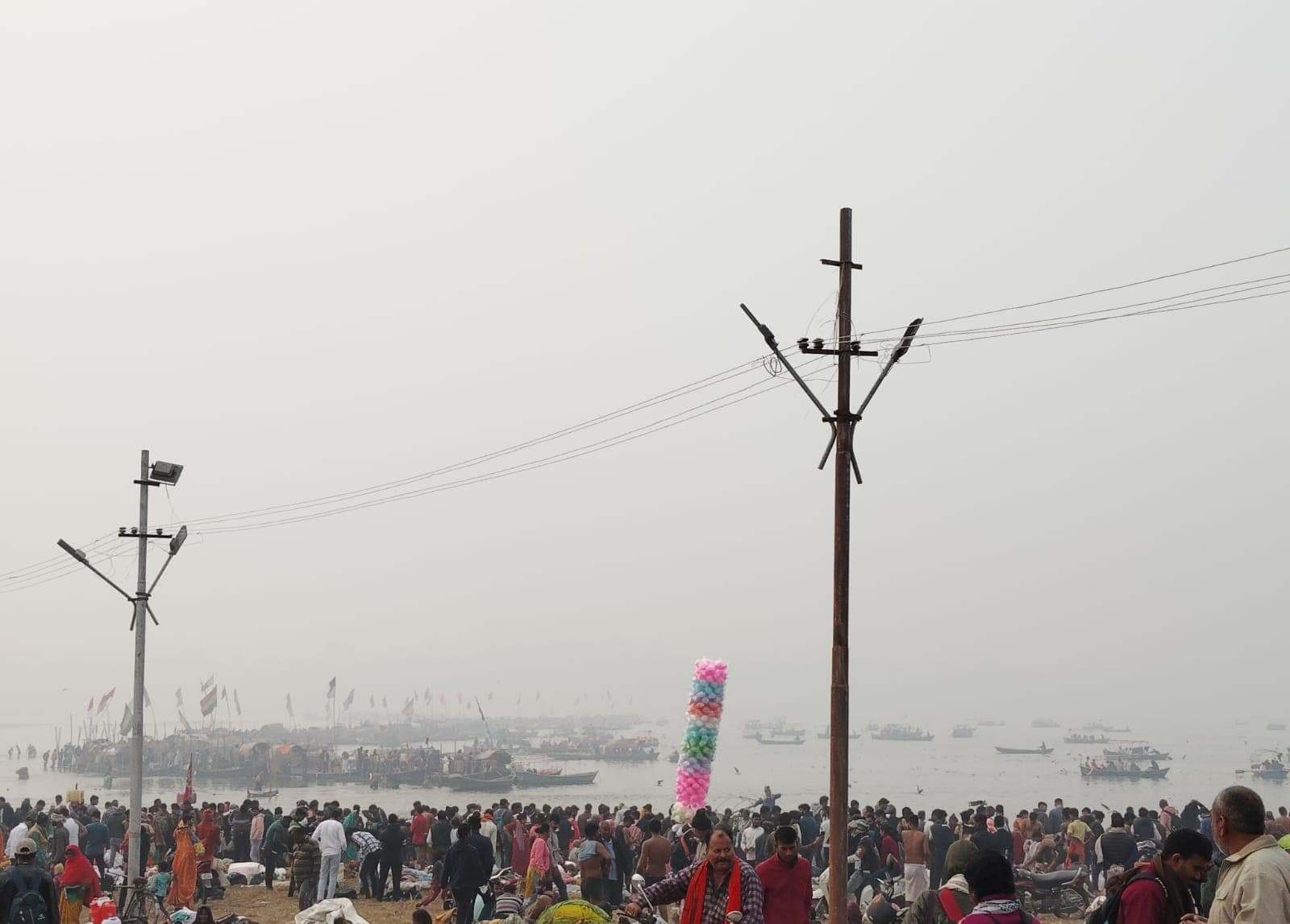 Aerial view of the Magh Mela tent city and pontoon bridges over the Ganga at Prayagraj