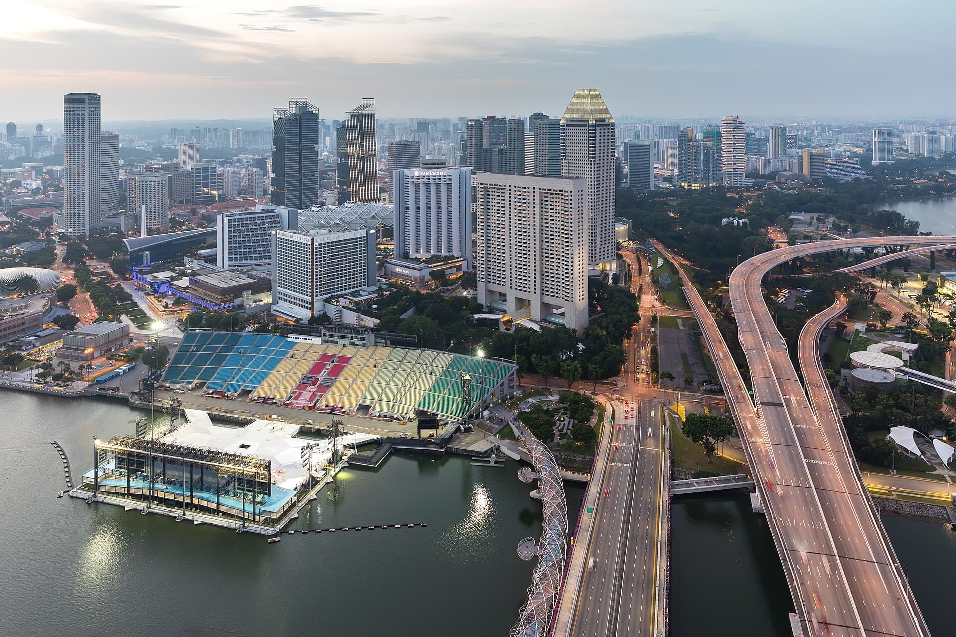 The Marina Bay Sands towers seen from the Helix Bridge at dusk in Singapore
